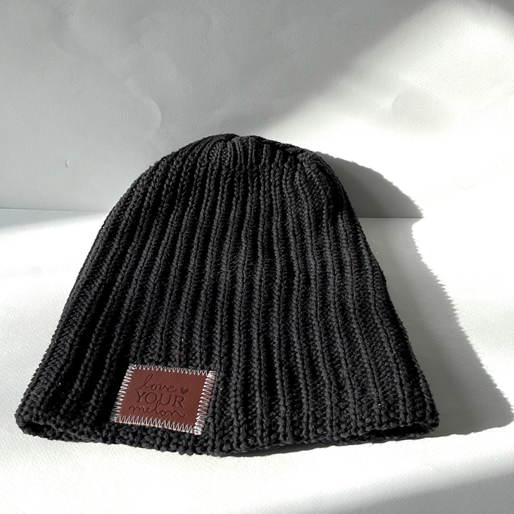 Love Your Melon solid black beanie with brown leather logo patch ✨